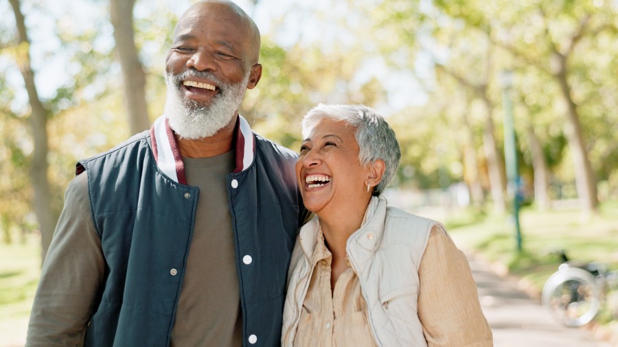 Senior couple in park for a walk