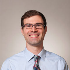 Evan C Tschirhart, MD
